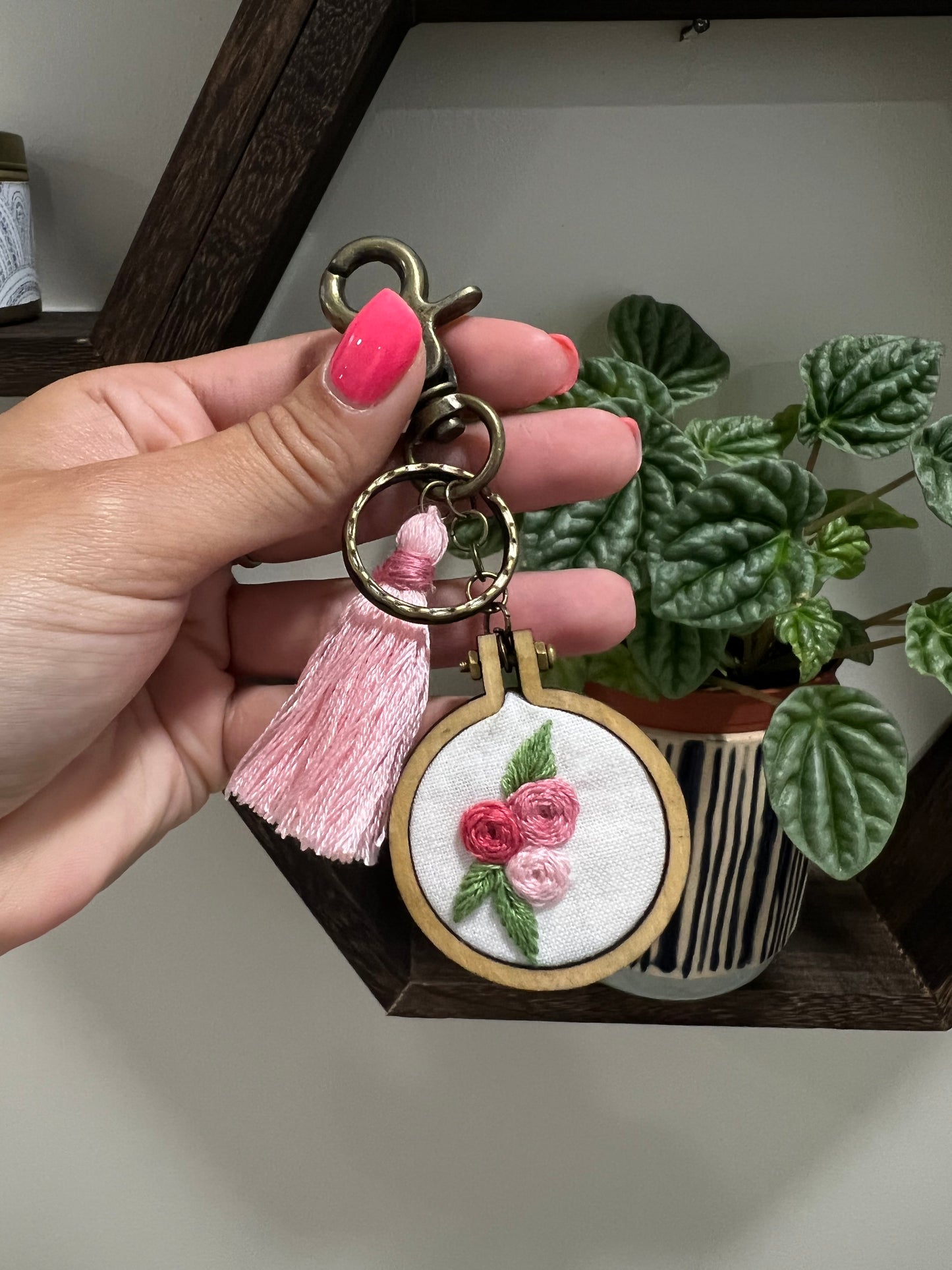 Hand embroidered keychain with pink flowers